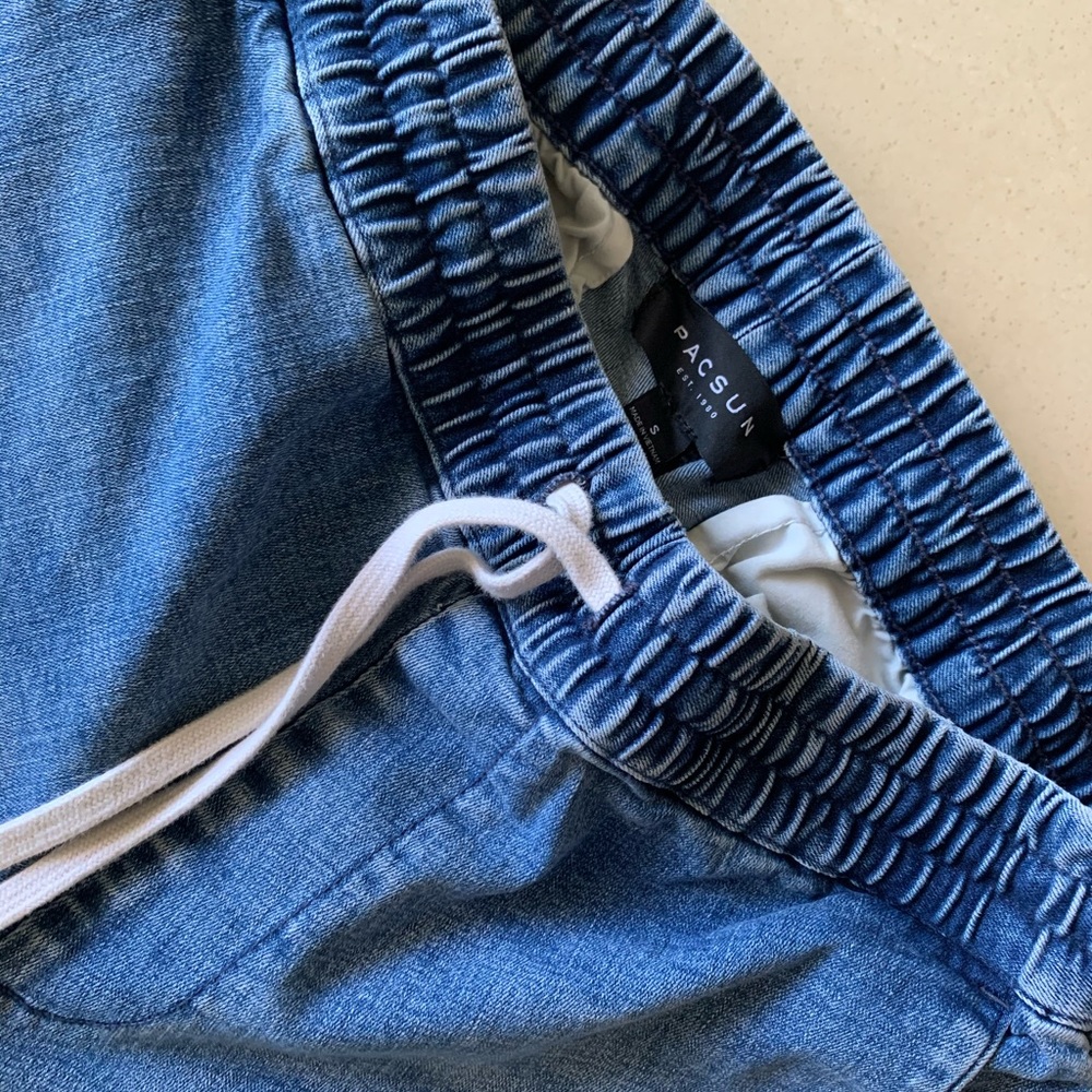 PacSun Elastic Waist Medium Wash Denim Zip Detail.  Offers welcome